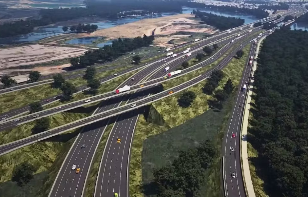 Artist’s impression of major motorway interchange upgrade in north Brisbane showing expanded lanes and new overpass infrastructure.